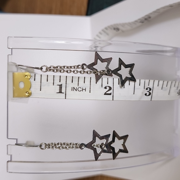 Silver Tone Cascading Stars Earrings - Picture 3 of 4